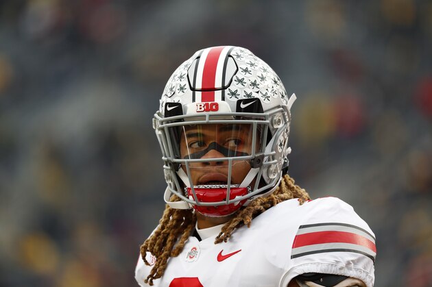 Ohio State defensive end Chase Young warms up before an NCAA college football game against Michigan in Ann Arbor, Mich., Saturday, Nov. 30, 2019. (AP Photo/Paul Sancya)