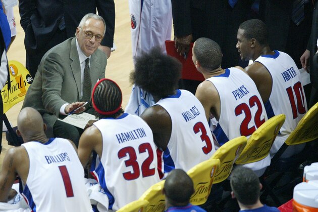Detroit Pistons head coach Larry Brown talks to his team during a timeout in the third quarter against the Miami Heat in their Eastern Conference Finals at the Palace in Auburn Hills, Mich., Tuesday, May 31, 2005. From left, are guard Chauncey Billups (1), guard Richard Hamilton (32), center Ben Wallace (3), forward Tayshaun Prince (22) and guard Lindsey Hunter. (AP Photo/Al Goldis)