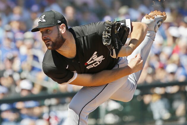 Chicago White Sox starting pitcher Lucas Giolito (27) pitches in the first inning of a spring training baseball game against the Chicago Cubs, Friday, March 6, 2020, in Mesa, Ariz. (AP Photo/Sue Ogrocki)