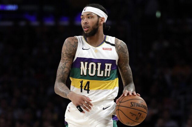 New Orleans Pelicans' Brandon Ingram (14) dribbles during the second half of an NBA basketball game against the Los Angeles Lakers Tuesday, Feb. 25, 2020, in Los Angeles. (AP Photo/Marcio Jose Sanchez)
