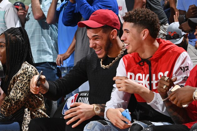 Las Vegas, NV - JULY 5: LaMelo Ball and Lonzo Ball #2 of the New Orleans Pelicans attend the game between the New York Knicks and the New Orleans Pelicans during Day 1 of the 2019 Las Vegas Summer League on July 5, 2019 at the Thomas & Mack Center in Las Vegas, Nevada. NOTE TO USER: User expressly acknowledges and agrees that, by downloading and or using this Photograph, user is consenting to the terms and conditions of the Getty Images License Agreement. Mandatory Copyright Notice: Copyright 2019 NBAE (Photo by Garrett Ellwood/NBAE via Getty Images)