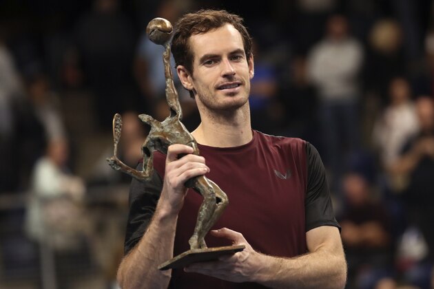 Andy Murray of Britain poses with the trophy after winning the European Open final tennis match in Antwerp, Belgium, Sunday, Oct. 20, 2019. Murray defeated Stan Wawrinka of Switzerland 3-6/6-4/6-4. (AP Photo/Francisco Seco)