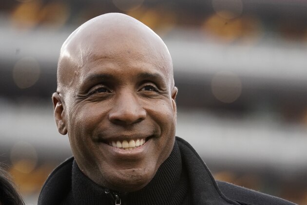 Former baseball player Barry Bonds smiles before the NFL NFC Championship football game between the San Francisco 49ers and the Green Bay Packers Sunday, Jan. 19, 2020, in Santa Clara, Calif. (AP Photo/Tony Avelar)