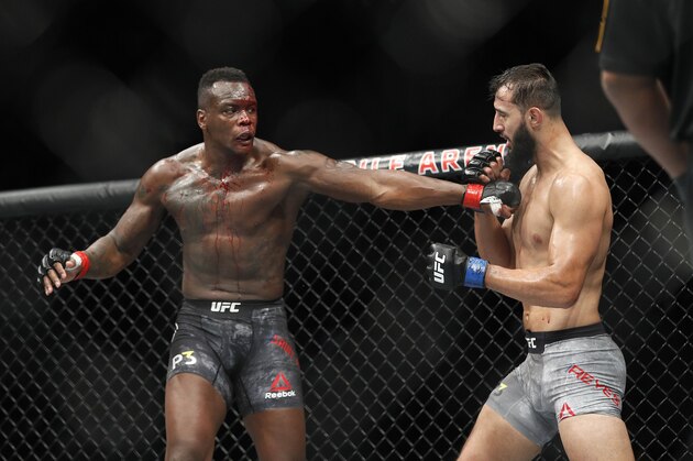 Ovince Saint Preux, left, fights Dominick Reyes during a light heavyweight mixed martial arts bout at UFC 229 in Las Vegas, Saturday, Oct. 6, 2018. (AP Photo/John Locher)