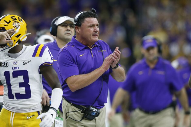 LSU head coach Ed Orgeron watches during the first half of a NCAA College Football Playoff national championship game against Clemson Monday, Jan. 13, 2020, in New Orleans. (AP Photo/Gerald Herbert)