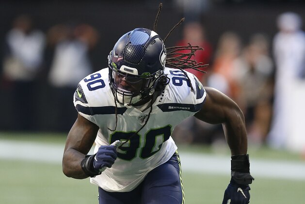 Seattle Seahawks defensive end Jadeveon Clowney (90) breaks off the line of scrimmage in a week 7 NFL football game against the Atlanta Falcons, Sunday, Sep. 27, 2019 in Atlanta. (Michael Zarrilli/AP Images for Panini, via AP)