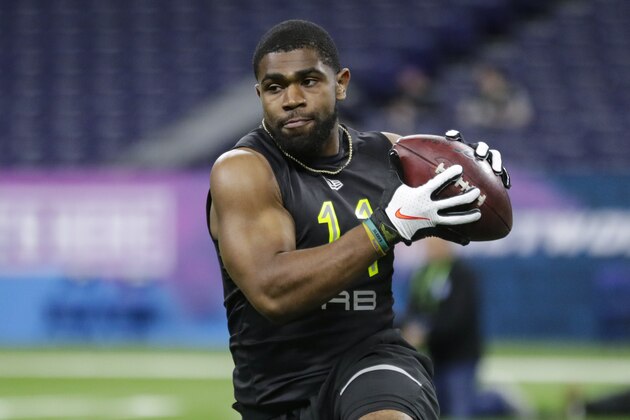 LSU running back Clyde Edwards-Helaire runs a drill at the NFL football scouting combine in Indianapolis, Friday, Feb. 28, 2020. (AP Photo/Michael Conroy)