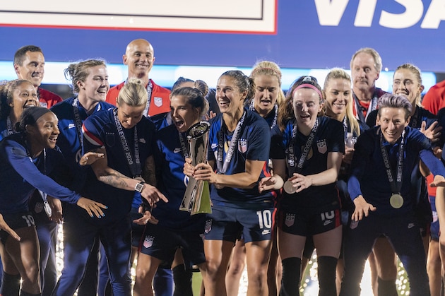 FRISCO, TX - MARCH 11: Carli Lloyd #10 of the United States raises the trophy during a game between Japan and USWNT at Toyota Stadium on March 11, 2020 in Frisco, Texas. (Photo by Brad Smith/ISI Photos/Getty Images)