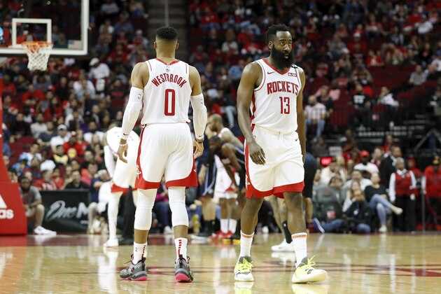HOUSTON, TEXAS - MARCH 08: James Harden #13 of the Houston Rockets and Russell Westbrook #0 react on the court in the first half against the Orlando Magic at Toyota Center on March 08, 2020 in Houston, Texas. NOTE TO USER: User expressly acknowledges and agrees that, by downloading and or using this photograph, User is consenting to the terms and conditions of the Getty Images License Agreement. (Photo by Tim Warner/Getty Images) HOUSTON, TEXAS - MARCH 08: James Harden #13 of the Houston Rockets and Russell Westbrook #0 react on the court in the first half against the Orlando Magic at Toyota Center on March 08, 2020 in Houston, Texas. NOTE TO USER: User expressly acknowledges and agrees that, by downloading and or using this photograph, User is consenting to the terms and conditions of the Getty Images License Agreement. (Photo by Tim Warner/Getty Images)