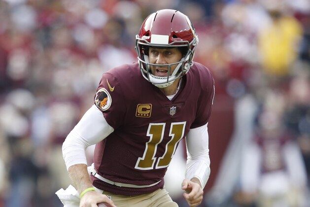 LANDOVER, MD - NOVEMBER 18: Alex Smith #11 of the Washington Redskins runs with the ball during the game against the Houston Texans at FedExField on November 18, 2018 in Landover, Maryland. The Texans won 23-21. (Photo by Joe Robbins/Getty Images)