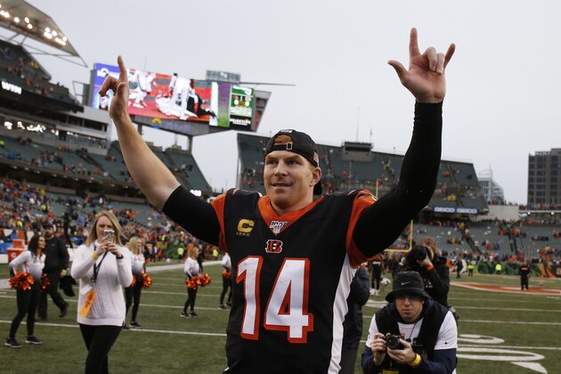 Cincinnati Bengals quarterback Andy Dalton celebrates after the Bengals defeated the Cleveland Browns 33-23 in an NFL football game, Sunday, Dec. 29, 2019, in Cincinnati. (AP Photo/Gary Landers)