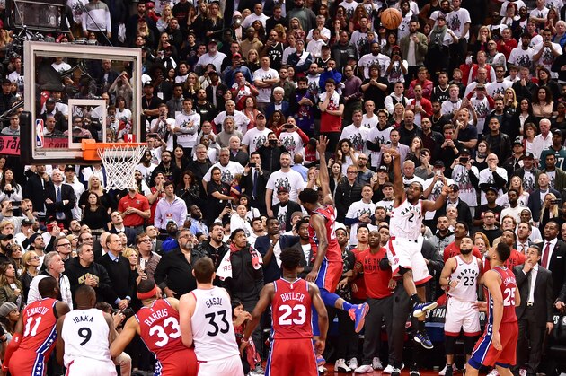 TORONTO, CANADA - MAY 12: Kawhi Leonard #2 of the Toronto Raptors shoots the game winning basket against the Philadelphia 76ers during Game Seven of the Eastern Conference Semi-Finals of the 2019 NBA Playoffs on May 12, 2019 at the Scotiabank Arena in Toronto, Ontario, Canada.  NOTE TO USER: User expressly acknowledges and agrees that, by downloading and or using this Photograph, user is consenting to the terms and conditions of the Getty Images License Agreement.  Mandatory Copyright Notice: Copyright 2019 NBAE (Photo by David Dow/NBAE via Getty Images)
