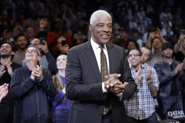 Julius Erving smiles during a tribute to him during the first half of an NBA basketball game between the Brooklyn Nets and the San Antonio Spurs Friday, March 6, 2020, in New York. (AP Photo/Frank Franklin II)