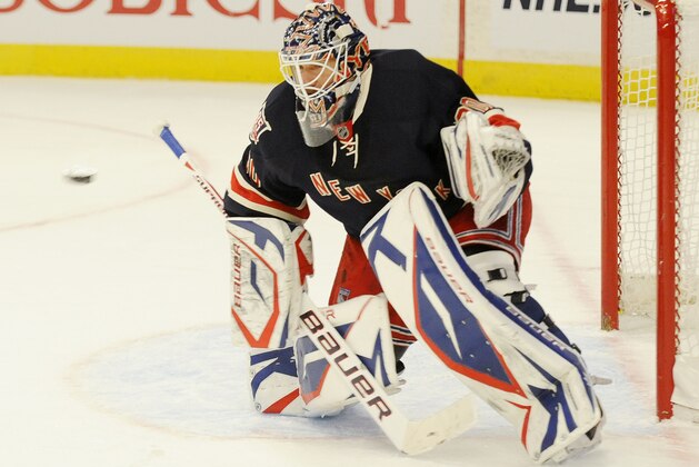New York Rangers' goalie Henrik Lundqvist makes a save against the Ottawa Senators in the first period of their hockey game at Madison Square Garden in New York, Sunday, Dec. 5, 2010.  (AP Photo/Henny Ray Abrams)