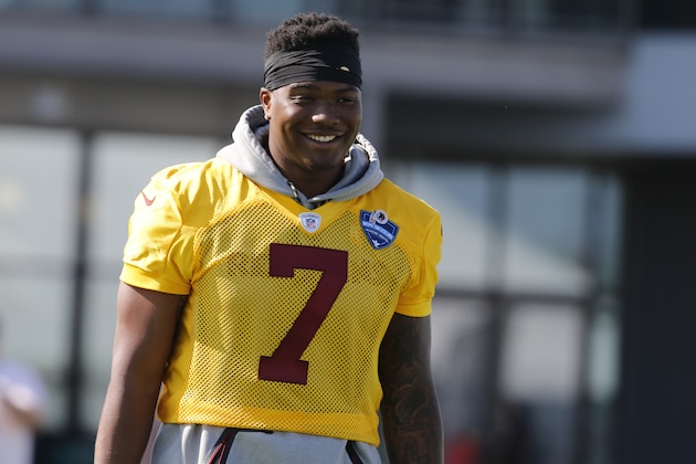 Washington Redskins quarterback Dwayne Haskins Jr. (7) heads to the practice field during the first day of the Washington Redskins NFL football training camp in Richmond, Va., Thursday, July 25, 2019. (AP Photo/Steve Helber)