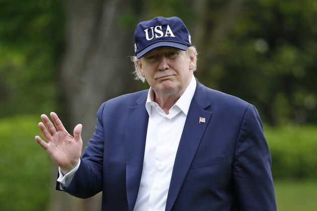 President Donald Trump walks on the South Lawn of the White House after stepping off Marine One, Sunday, May 3, 2020, in Washington. Trump is returning from a trip to Camp David, Md. (AP Photo/Patrick Semansky)