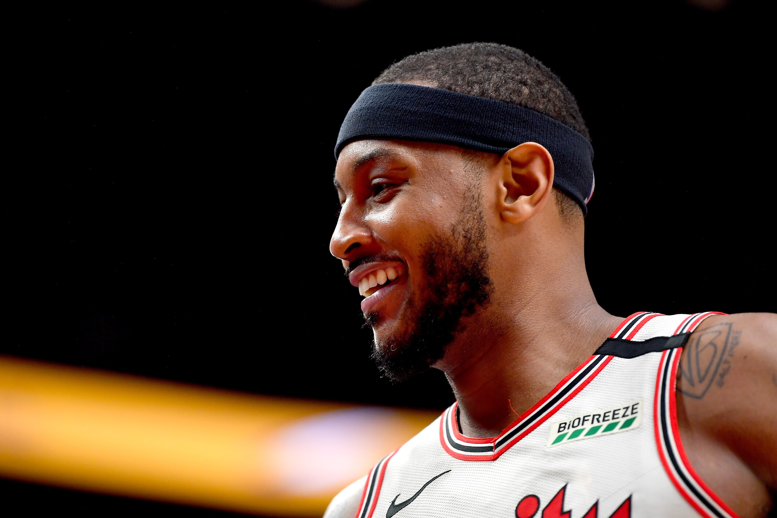 PORTLAND, OREGON - MARCH 04: Carmelo Anthony #00 of the Portland Trail Blazers is all smiles during the second half of the game against the Washington Wizards at the Moda Center on March 04, 2020 in Portland, Oregon. The Portland Trail Blazers topped the Washington Wizards, 125-105. (Photo by Alika Jenner/Getty Images)