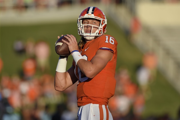 Clemson quarterback Trevor Lawrence warms up before the start of an NCAA college football game against Charlotte Saturday, Sept. 21, 2019, in Clemson, S.C. (AP Photo/Richard Shiro)