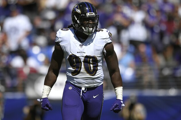 Baltimore Ravens linebacker Pernell McPhee runs on the field in the first half of an NFL football game against the Arizona Cardinals, Sunday, Sept. 15, 2019, in Baltimore. (AP Photo/Nick Wass)