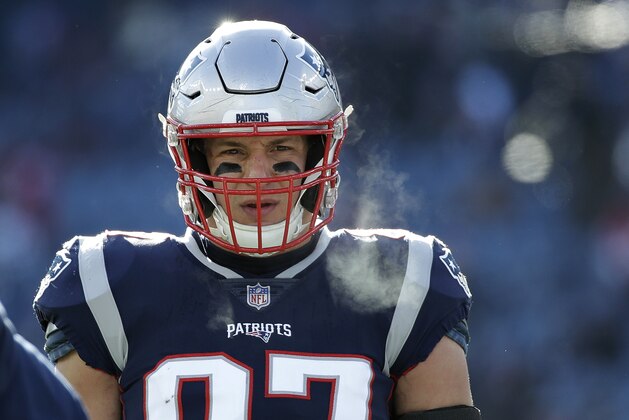 New England Patriots tight end Rob Gronkowski warms up before an NFL divisional playoff football game against the Los Angeles Chargers, Sunday, Jan. 13, 2019, in Foxborough, Mass. (AP Photo/Elise Amendola) New England Patriots tight end Rob Gronkowski warms up before an NFL divisional playoff football game against the Los Angeles Chargers, Sunday, Jan. 13, 2019, in Foxborough, Mass. (AP Photo/Elise Amendola)