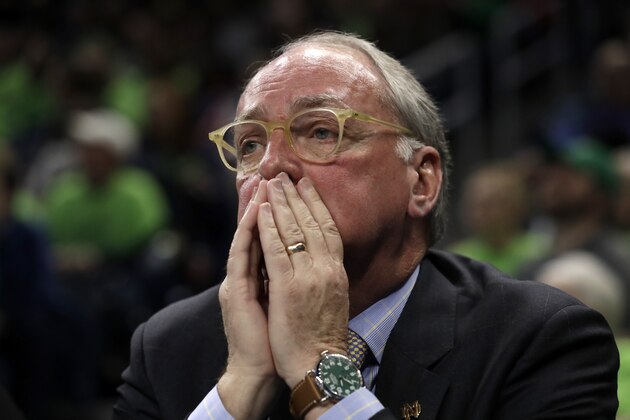 Notre Dame Vice President and Director of Athletics Jack Swarbrick watches during the first half of a regional championship game between Notre Dame and Stanford in the NCAA women's college basketball tournament, Monday, April 1, 2019, in Chicago. (AP Photo/Nam Y. Huh)