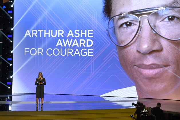 Former first lady Michelle Obama presents the Arthur Ashe Courage Award at the ESPYS at the Microsoft Theater on Wednesday, July 12, 2017, in Los Angeles. (Photo by Chris Pizzello/Invision/AP) Former first lady Michelle Obama presents the Arthur Ashe Courage Award at the ESPYS at the Microsoft Theater on Wednesday, July 12, 2017, in Los Angeles. (Photo by Chris Pizzello/Invision/AP)