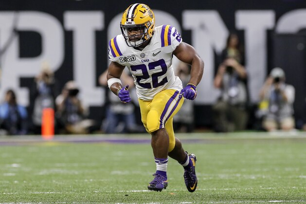 NEW ORLEANS, LA - JANUARY 13: Runningback Clyde Edwards-Helarie #22 of the LSU Tigers during the College Football Playoff National Championship game against the Clemson Tigers at the Mercedes-Benz Superdome on January 13, 2020 in New Orleans, Louisiana. LSU defeated Clemson 42 to 25. (Photo by Don Juan Moore/Getty Images)