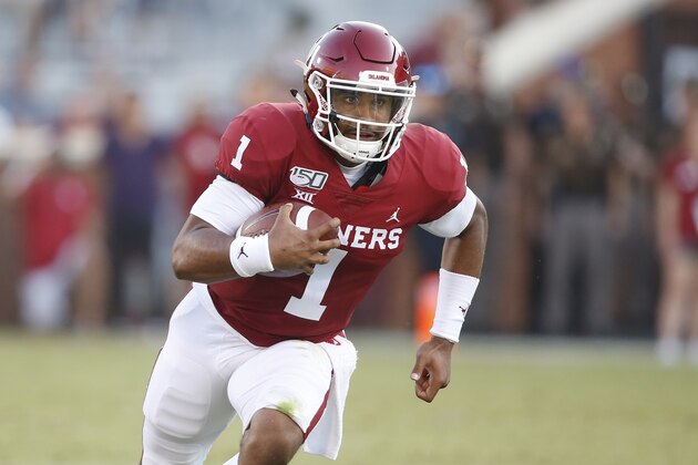 Oklahoma quarterback Jalen Hurts (1) carries in the second quarter of an NCAA college football game against South Dakota Saturday, Sept. 7, 2019, in Norman, Okla. (AP Photo/Sue Ogrocki)
