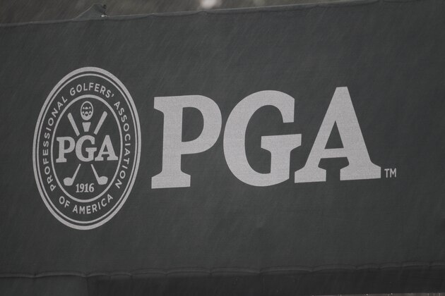 The PGA Championsip logo is seen during a storm during a practice round for the PGA Championship golf tournament Wednesday, Aug. 11, 2010, at Whistling Straits in Haven, Wis. (AP Photo/Eric Gay)