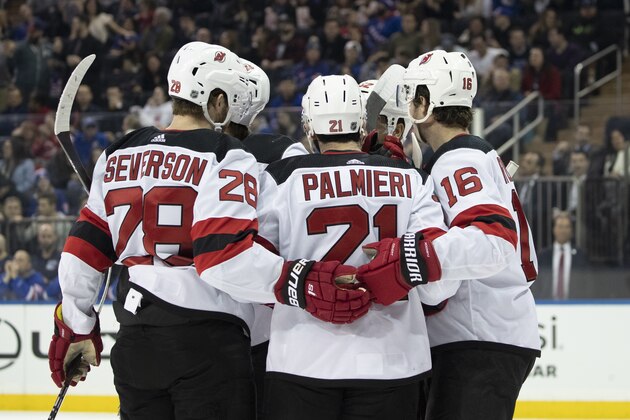 New Jersey Devils right wing Kyle Palmieri (21) celebrates after scoring a goal against the New York Rangers during the first period of an NHL hockey game, Saturday, March 7, 2020, at Madison Square Garden in New York. (AP Photo/Mary Altaffer)