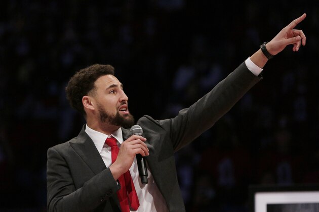 Golden State Warriors and former Washington State guard Klay Thompson speaks as the school retires his jersey number during halftime of an NCAA college basketball game between Washington State and Oregon State in Pullman, Wash., Saturday, Jan. 18, 2020. (AP Photo/Young Kwak)