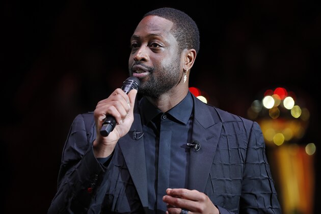 MIAMI, FLORIDA - FEBRUARY 22:  Former Miami Heat player Dwyane Wade addresses the crowd during his jersey retirement ceremony at American Airlines Arena on February 22, 2020 in Miami, Florida. NOTE TO USER: User expressly acknowledges and agrees that, by downloading and/or using this photograph, user is consenting to the terms and conditions of the Getty Images License Agreement.  (Photo by Michael Reaves/Getty Images)