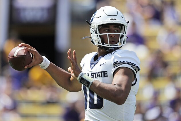 Utah State quarterback Jordan Love (10) passes in the second half of an NCAA college football game against LSU in Baton Rouge, La., Saturday, Oct. 5, 2019. LSU won 42-6. (AP Photo/Gerald Herbert)