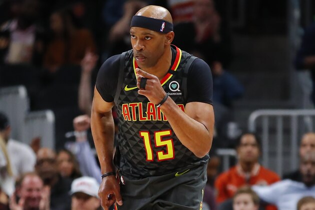 ATLANTA, GA - MARCH 09:  Vince Carter #15 of the Atlanta Hawks reacts after shooting a three pointer during the first half of an NBA game against the Charlotte Hornets at State Farm Arena on March 9, 2020 in Atlanta, Georgia. NOTE TO USER: User expressly acknowledges and agrees that, by downloading and/or using this photograph, user is consenting to the terms and conditions of the Getty Images License Agreement. (Photo by Todd Kirkland/Getty Images)