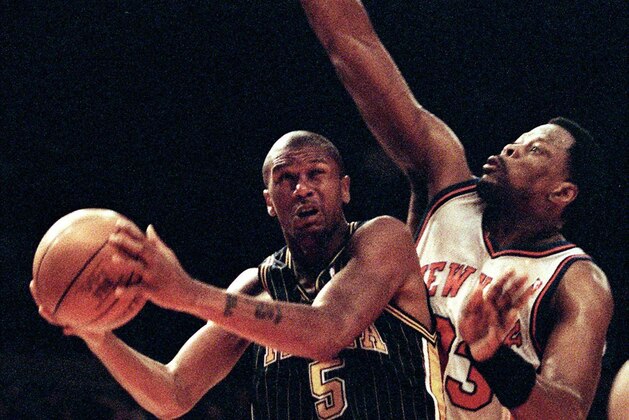 Indiana Pacers' forward Jalen Rose (L) has his path to the basket blocked by New York Knicks' center Patrick Ewing (R) during the second quarter 19 February 2000 at Madison Square Garden in New York, NY. AFP PHOTO/MATT CAMPBELL (Photo by MATT CAMPBELL / AFP) (Photo by MATT CAMPBELL/AFP via Getty Images) Indiana Pacers' forward Jalen Rose (L) has his path to the basket blocked by New York Knicks' center Patrick Ewing (R) during the second quarter 19 February 2000 at Madison Square Garden in New York, NY. AFP PHOTO/MATT CAMPBELL (Photo by MATT CAMPBELL / AFP) (Photo by MATT CAMPBELL/AFP via Getty Images)