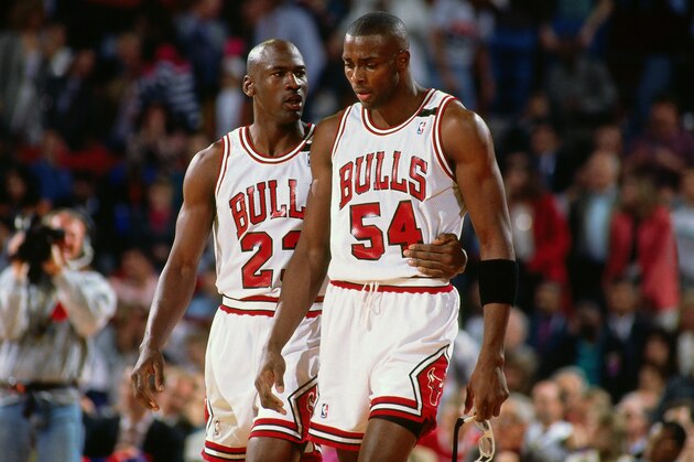 CHICAGO - CIRCA 1991: Michael Jordan #23 and Horace Grant #54 of the Chicago Bulls talk circa 1991 at Chicago Stadium in Chicago, Illinois. NOTE TO USER: User expressly acknowledges and agrees that, by downloading and or using this photograph, User is consenting to the terms and conditions of the Getty Images License Agreement. Mandatory Copyright Notice: Copyright 1991 NBAE (Photo by Nathaniel S. Butler/NBAE via Getty Images)