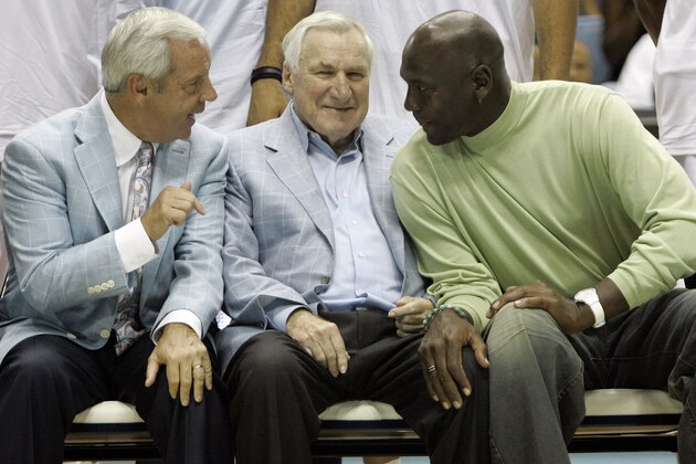 From left, North Carolina coach Roy Williams, former coach Dean Smith, and former North Carolina player Michael Jordan chat prior to a North Carolina men's professional alumni basketball game in Chapel Hill, N.C., Friday, Sept. 4, 2009. The alumni game, featuring North Carolina's current NBA and other professional alumni is the kickoff event celebrating the 100th year of the Tar Heel basketball program. (AP Photo/Gerry Broome)