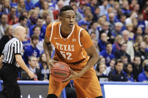 LAWRENCE, KS - FEBRUARY 28: Myles Turner #52 of the Texas Longhorns controls the ball against the Kansas Jayhawks at Allen Fieldhouse on February 28, 2015 in Lawrence, Kansas. Kansas won 69-64. (Photo by Ed Zurga/Getty Images)