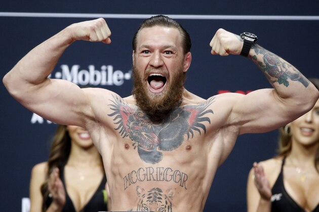Conor McGregor poses during a ceremonial weigh-in for the UFC 246 mixed martial arts bout, Friday, Jan. 17, 2020, in Las Vegas. McGregor is scheduled to fight Donald
