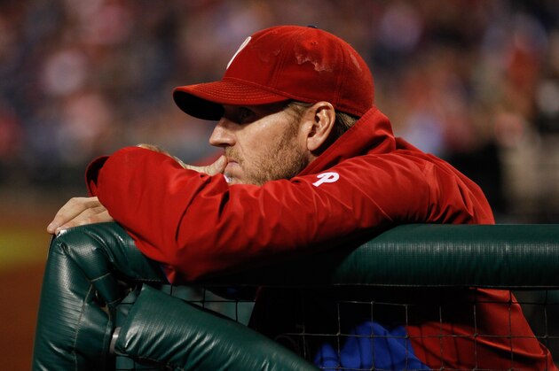 PHILADELPHIA, PA - SEPTEMBER 18: Roy Halladay #34 of the Philadelphia Phillies looks on from the dugout during the game against the Miami Marlins at Citizens Bank Park on September 18, 2013 in Philadelphia, Pennsylvania. The Marlins won 4-3 in the 10th inning. (Photo by Brian Garfinkel/Getty Images)