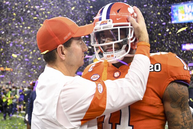 NEW ORLEANS, LA - JANUARY 13: Head coach Dabo Swinney of the Clemson Tigers embraces Isaiah Simmons #11 during the College Football Playoff National Championship held at the Mercedes-Benz Superdome on January 13, 2020 in New Orleans, Louisiana. (Photo by Justin Tafoya/Getty Images)