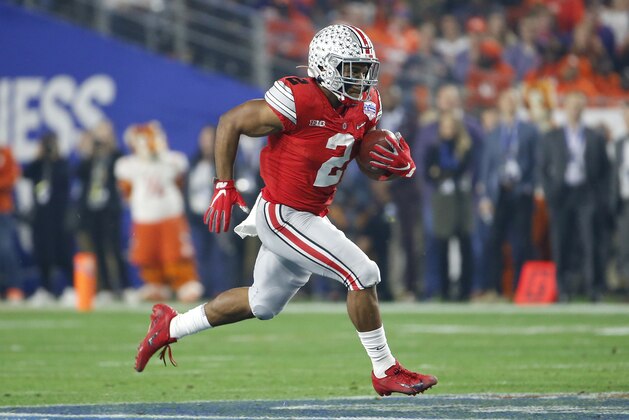 GLENDALE, ARIZONA - DECEMBER 28: Running back J.K. Dobbins #2 of the Ohio State Buckeyes carries the ball on a touchdown run against the Clemson Tigers during the first half of the College Football Playoff Semifinal at the PlayStation Fiesta Bowl at State Farm Stadium on December 28, 2019 in Glendale, Arizona. (Photo by Ralph Freso/Getty Images)