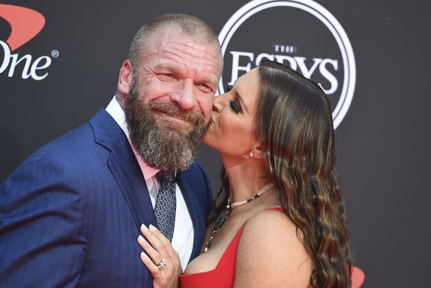 Triple H, left, and Stephanie McMahon, chief brand officer of WWE, arrive at the ESPY Awards on Wednesday, July 10, 2019, at the Microsoft Theater in Los Angeles. (Photo by Jordan Strauss/Invision/AP)