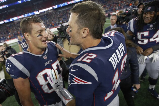 New England Patriots tight end Rob Gronkowski, left, and quarterback Tom Brady speak at midfield after beating the Kansas City Chiefs in an NFL football game, Sunday, Oct. 14, 2018, in Foxborough, Mass. (AP Photo/Michael Dwyer) New England Patriots tight end Rob Gronkowski, left, and quarterback Tom Brady speak at midfield after beating the Kansas City Chiefs in an NFL football game, Sunday, Oct. 14, 2018, in Foxborough, Mass. (AP Photo/Michael Dwyer)