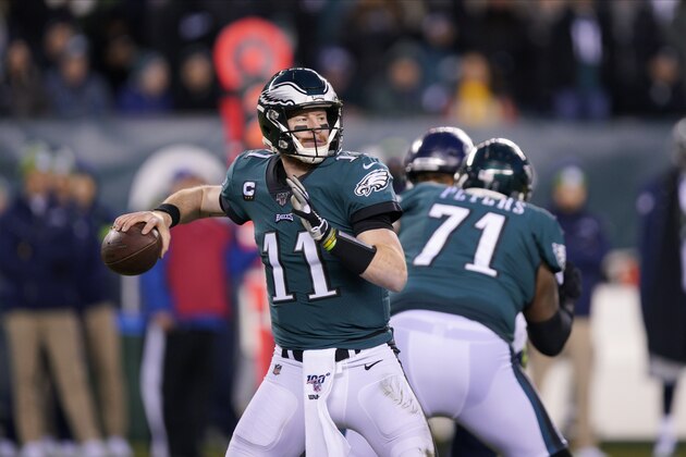 Philadelphia Eagles' Carson Wentz passes during the first half of an NFL wild-card playoff football game against the Seattle Seahawks, Sunday, Jan. 5, 2020, in Philadelphia. (AP Photo/Chris Szagola)