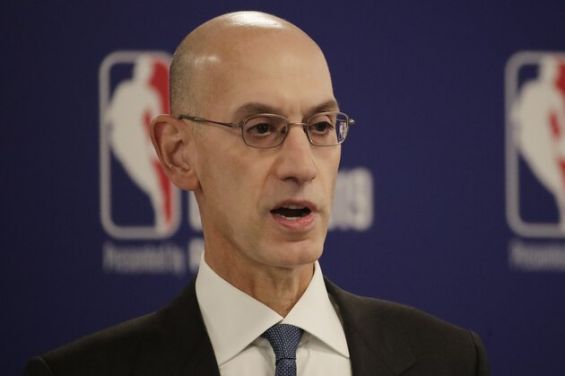 NBA Commissioner Adam Silver speaks at a news conference before an NBA preseason basketball game between the Houston Rockets and the Toronto Raptors Tuesday, Oct. 8, 2019, in Saitama, near Tokyo. (AP Photo/Jae C. Hong)