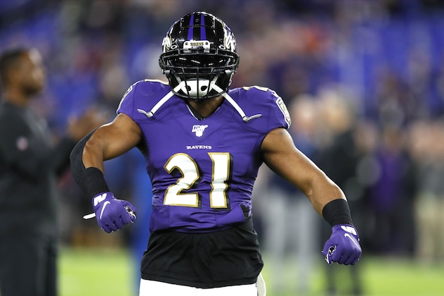Baltimore Ravens running back Mark Ingram gets pumped up while working out prior to an NFL divisional playoff football game against the Tennessee Titans, Saturday, Jan. 11, 2020, in Baltimore. The Titans won 28-12. (AP Photo/Julio Cortez)