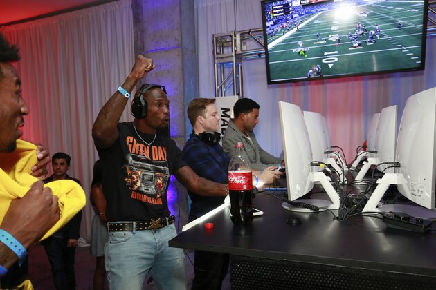 IMAGE DISTRIBUTED FOR EA SPORTS MADDEN NFL 18 - Longshot stars Chad Johnson, Scott Porter, and JR Lemon square off in the MUT Squads Tournament Finals at the Madden NFL 18 Launch Event held Thursday, Aug 24, 2017 in New York City. Madden NFL 18 is available Friday, August 25. (Mark Von Holden/AP Images for EA SPORTS Madden NFL 18)