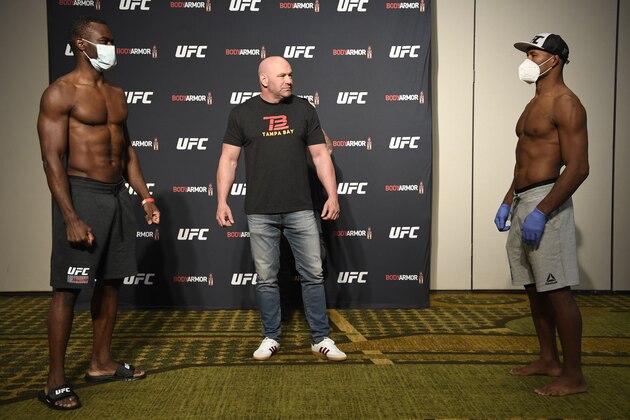 JACKSONVILLE, FLORIDA - MAY 08: (L-R) Opponents Uriah Hall of Jamaica and Jacare Souza of Brazil face off during the UFC 249 official weigh-in on May 08, 2020 in Jacksonville, Florida. (Photo by Mike Roach/Zuffa LLC)