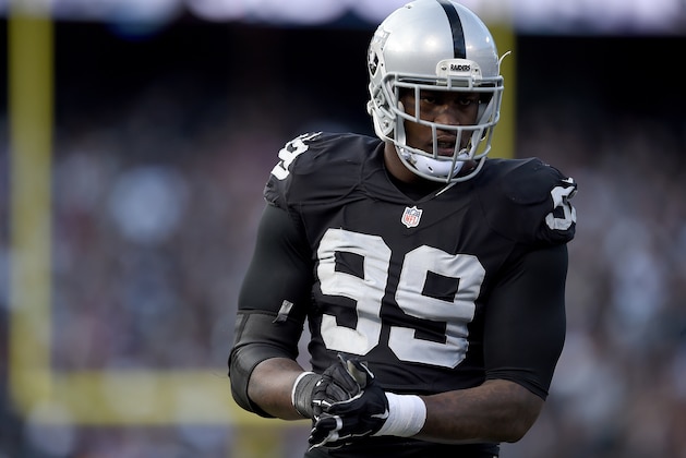 OAKLAND, CA - NOVEMBER 15:  Aldon Smith #99 of the Oakland Raiders looks on during a timeout against the Minnesota Vikings in the third quarter of their NFL football game at O.co Coliseum on November 15, 2015 in Oakland, California.  (Photo by Thearon W. Henderson/Getty Images)